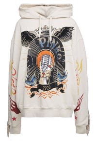 Beige mikina s kapucí a grafickým potiskem, který zobrazuje vintage mikrofon, křídla a barevné akcenty. Obsahuje stahovací šňůrky a řetězové detaily na manžetách.