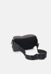 Armani Exchange MARSUPIO UNISEX - Ľadvinka - black olive