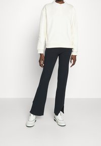 Claudie Pierlot Mikina - off-white