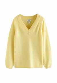 Gul v-hals sweater med lange ærmer, lavet af blødt materiale. Har ribbede detaljer ved kraven og manchetterne, blød tekstur og et enkelt design.