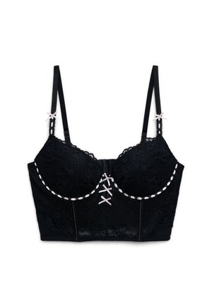 Reggiseno lungo in pizzo nero con sottili spalline regolabili, dettagli di fiocchi rosa chiaro sulle spalline e sul davanti, e decorazioni con nastro rosa lungo le coppe.