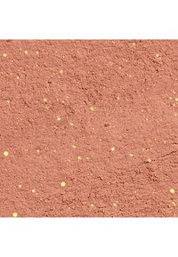 Poudre rose avec de petites taches jaunes vives éparpillées et une surface texturée.