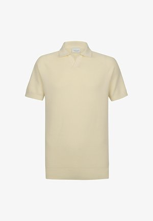 Korte mouwen polo in lichtgele gebreide stof met een kraag, voorzien van een strak ontwerp en een geribbelde textuur over het geheel.