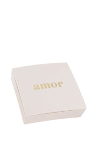 White square box with a glossy finish, featuring the word "amor" in gold lettering on the lid. Edges are slightly rounded.