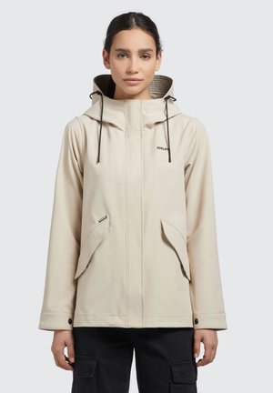Light beige waterproof jacket with a hood, featuring adjustable drawstrings, two front pockets, and branded logo on the chest.