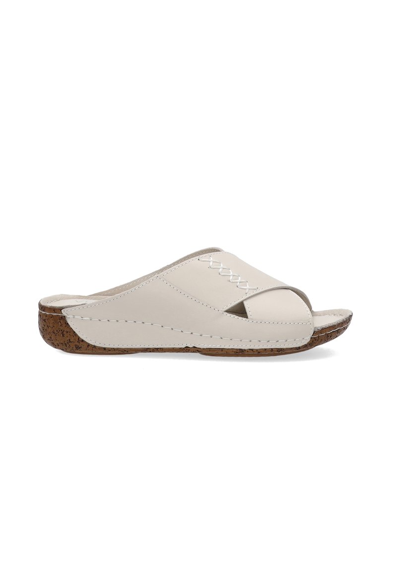 White leather slide sandals with a cross-band design, showcasing an almond toe, cork sole, and visible stitching detail.