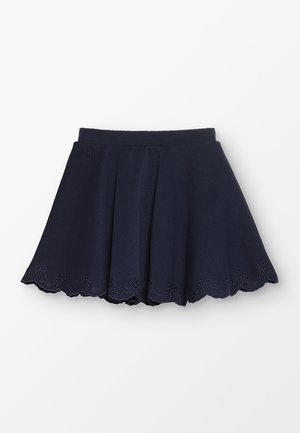 Jupe patineuse bleu marine avec un ourlet festonné et des détails en œillets, fabriquée en tissu texturé avec une taille ajustée pour plus de confort.