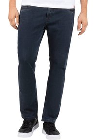 Dunkelblaue Jeans aus Denim mit geradem Bein, Fünf-Taschen-Design und subtilen Nähdetails. Tragen mit schwarzen Sneakern.