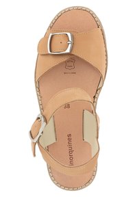 Tan leather sandal with two straps, a silver metal buckle, and a cushioned insole. Features a braided sole and a rounded toe design.