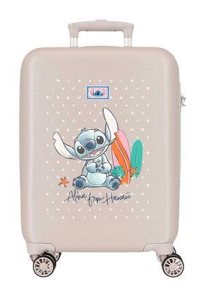 Maleta beige con un personaje de alienígena azul en estilo caricatura, tablas de surf, estrellas de mar y el texto "Aloha from Hawaii" en el frente, con cuatro ruedas giratorias.