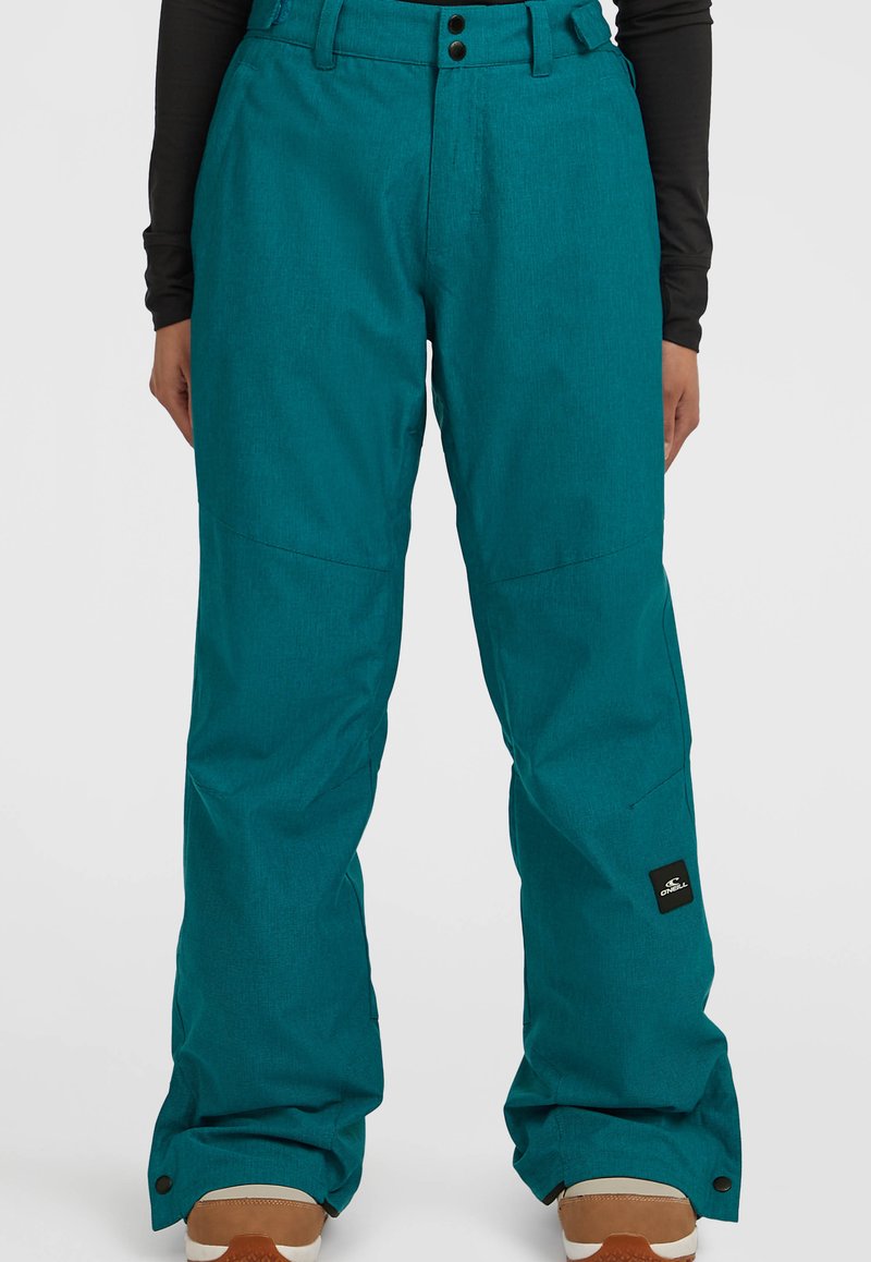 Teal sneeuwbroeken gemaakt van duurzaam materiaal, met een relaxed fit, twee voorknopjes en een logopatch op het linkerpant.