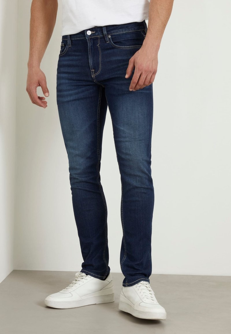 Jean Slim GUESS Adriano Super Skinny - Bleu Brut - Taille 36 FR / 27 US - Neuf Avec étiquettes