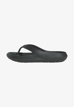 Chanclas negras de goma con suela texturizada, tira en forma de V y suaves estrías a lo largo del lateral para agarre y comodidad.
