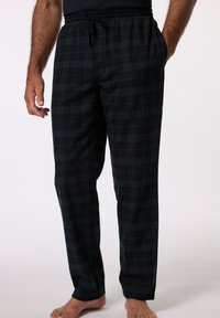 Donkergroene geruite heren pyjamabroek met een elastische tailleband, bindkoordsluiting en zijzakken. Zachte, geweven stoftextuur.