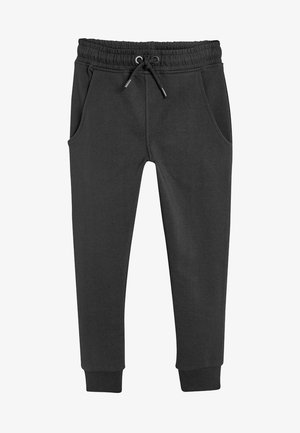 Dunkelgraue Jogginghose mit elastischem Bund, schwarzer Kordel, Fronttaschen und gerippten Bündchen an den Knöcheln.