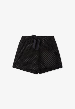 Shorts neri in cotone con una texture morbida, caratterizzati da pois bianchi, una cintura elastica e un dettaglio in raso.