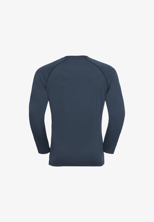 Long-sleeved athletic shirt in dark blue, ribbed texture, rounded neckline, flat seams, and fitted design suitable for active wear.