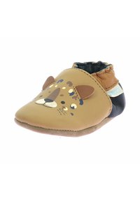 Mocassin en cuir marron avec un design de visage de lion, des accents d'oreilles et de nez, un dos noir et une semelle douce et plate.