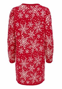 Röd stickad klänning med ett snöflinge-mönster i vitt, långa ärmar och rund halsringning. Mjuk textur med en avslappnad passform.