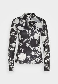 Langarmtop met een zwarte achtergrond en witte bloemenpatronen. Gemaakt van lichtgewicht stof met een hoge halslijn en een getailleerd ontwerp.