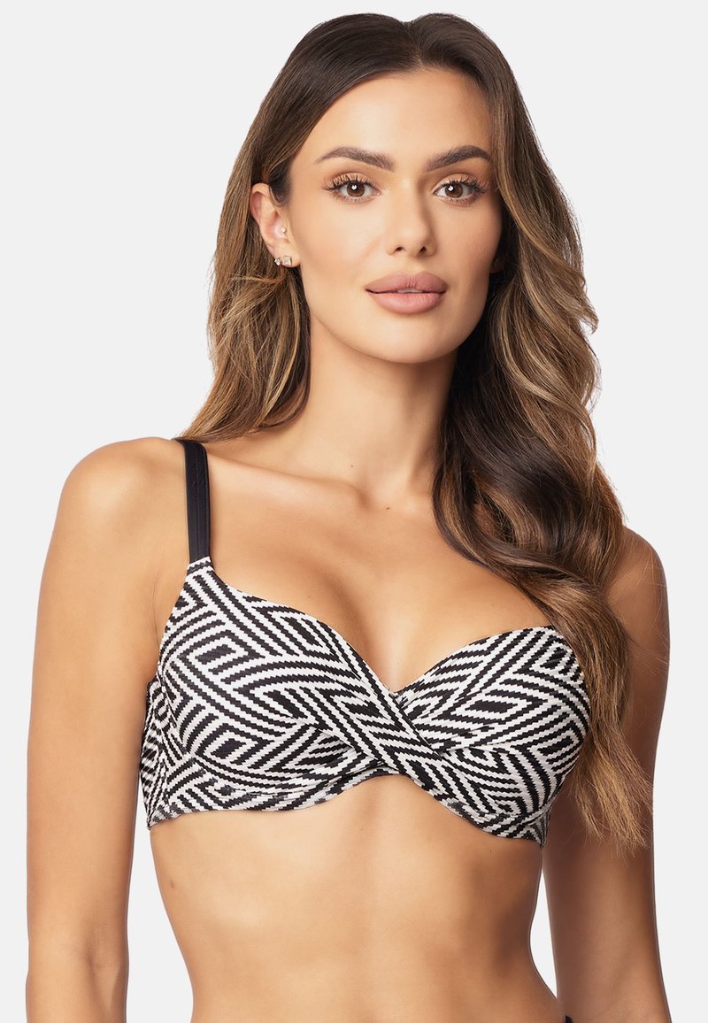 Zwart-wit geometrisch patroon bikini top met gevormde cups, verstelbare bandjes en een gedraaide voorkant. Glad textuur.