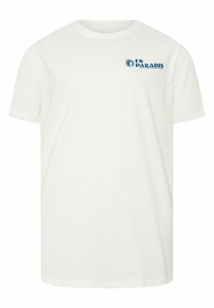 T-shirt bianca a maniche corte con piccolo testo blu "ES PARADIS" e logo del sole nella parte superiore sinistra del petto.