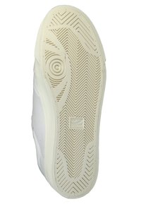 Suola di sneaker in gomma bianca con un motivo di battistrada testurizzato e scanalature circolari, con un logo incorporato nella zona del tallone.