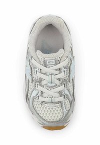 Light grey athletic shoe with mesh upper, silver accents, and white laces. Cushioned sole with a tan rubber outsole. Rounded toe design.