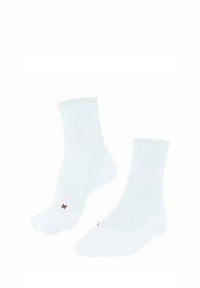 Chaussettes de sport blanches en mélange de coton, avec des bords côtelés et des talons renforcés. Petit logo rouge sur la semelle.
