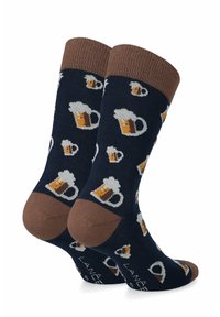 Granatowe skarpetki z brązowymi mankietami, z wzorem piw mug i pianki. Wykonane z materiału tekstylnego, z wzmocnionymi palcami i piętami.