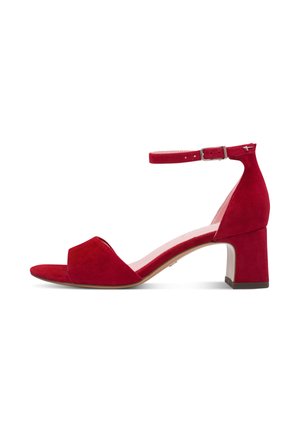 Red suede women's sandal with block heel and ankle strap, open toe design, and silver buckle closure.