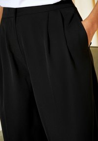 Friends Like These Tygbyxor - black