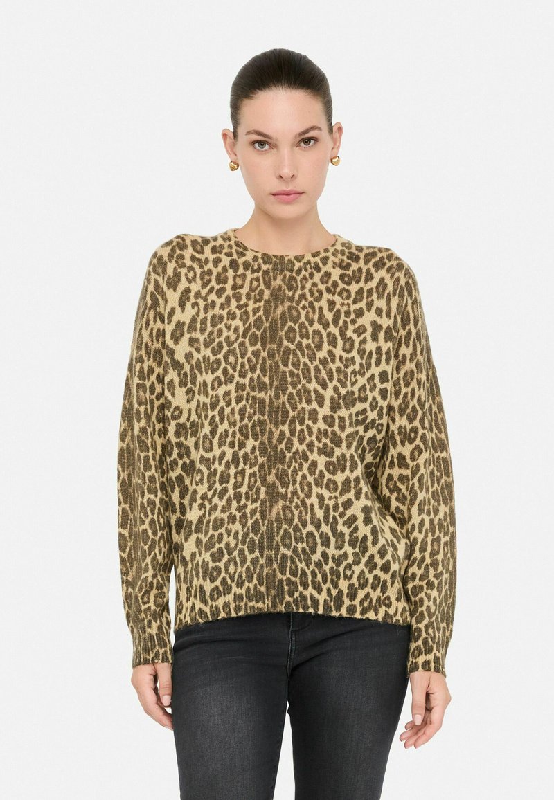 Maglione a stampa felino in beige e marrone, maniche lunghe, vestibilità comoda, tessuto a maglia testurizzato con polsini e orlo a coste.