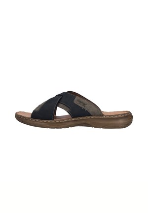 Casual brown and black open-toe slip-on sandal with crossed straps and stitched sole, designed for comfort and everyday wear.