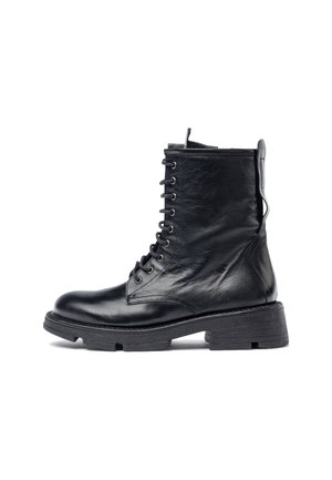 Schwarze Leder Schnürstiefelette mit runder Zehenform, robustem Gummisohle, Metallösen und einer Zuglasche hinten für ein einfaches An- und Ausziehen.