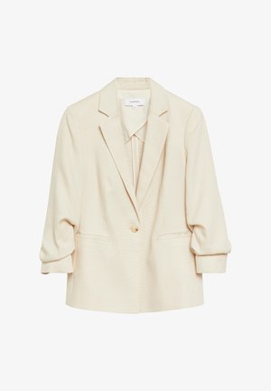 Kremowa damska marynarka z wyciętymi klapami, zapięciem na jeden guzik, dwoma przednimi kieszeniami i marszczonymi rękawami o długości 3/4.