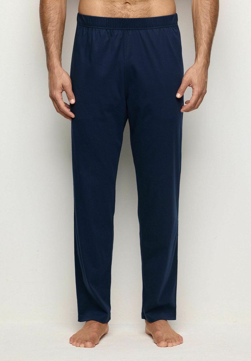 Navy sininen, kevyet, joustava vyötärö housut suoran lahkeen muotoilulla. Valmistettu pehmeästä kankaasta. Ei kuvioita tai koristeluja.
