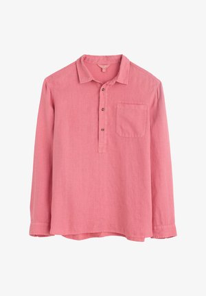 Koszula z długim rękawem, zapinana na guziki, w jasnoróżowym lnie. Posiada kołnierz w szpic, pojedynczą kieszeń na piersi oraz brązowe guziki przy plisie.