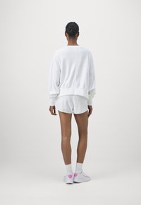 Nike Performance HERITAGE - Spordišortsid - white