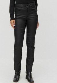 STOCKH LM THYRA COATED - Tygbyxor - black