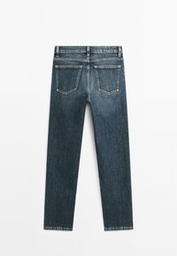 Dark blue denim jeans with a straight leg design, featuring two back pockets and a raw hem at the ankles. Classic five-pocket style.
