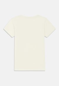 Κοντομάνικο T-shirt με στρογγυλή λαιμόκοψη σε εκρού ύφασμα. Ομαλή υφή με απλό, λιτό σχέδιο και ίσια γραμμή.