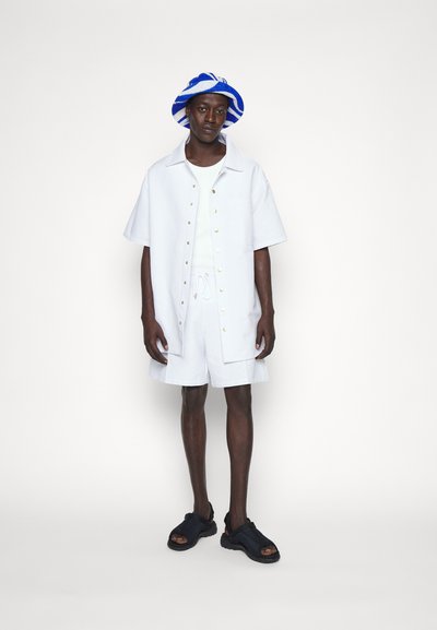 Nikolaj Storm CYRUS PIN UNISEX - Παντελόνι φόρμας - white