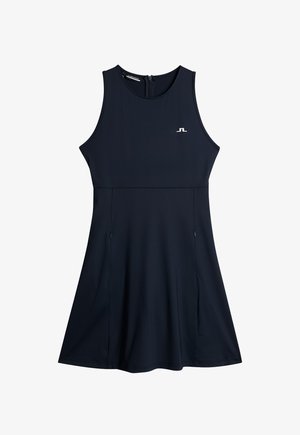 Laivastonsininen hihaton mekko, joka on valmistettu sileästä kankaasta. Mekossa on pyöreä kaula-aukko ja levenevä hame, jossa on sivutaskut. Rintaosassa logo.