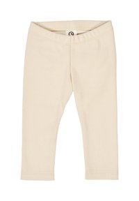 Leggings a coste di colore crema con una vita elasticizzata e un design aderente, privi di motivi visibili o dettagli metallici.