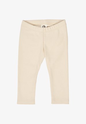 Crèmegekleurde geribde legging met een rekbare tailleband en een aansluitend ontwerp, zonder zichtbare patronen of hardwaredetails.