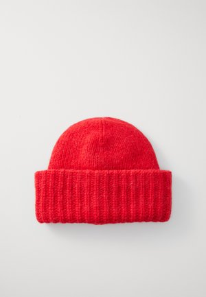 Red knitted beanie hat with a ribbed cuff, round crown, and soft texture. Even coloration throughout, no patterns or additional accents.