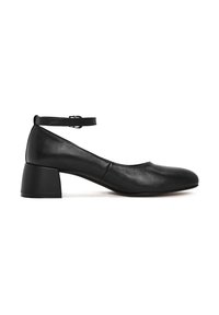 Zapatos de tacón con correa al tobillo de cuero negro, con punta redonda y tacón cuadrado. Textura suave con un diseño minimalista. Correa ajustable en el tobillo.