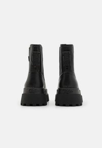 Buffalo PLUTO CHELSEA - Botine cu platformă - black