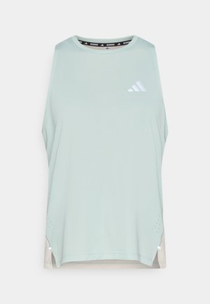 Top verde menta senza maniche con scollo arrotondato, logo riflettente, perforazioni laterali e orlo posteriore leggermente più lungo.